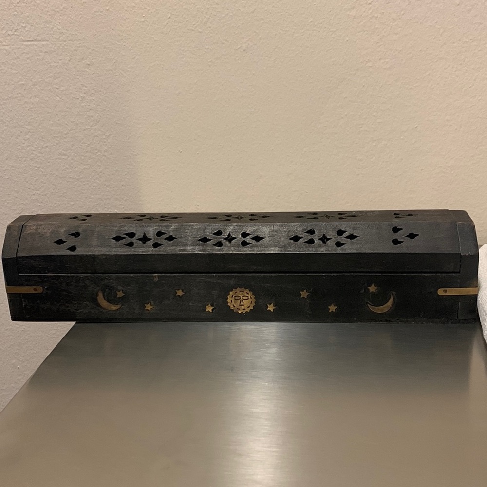 Real wood incense holder in black/dark brown with incense sticks